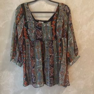 Pinky blouse with gathered back and tie.